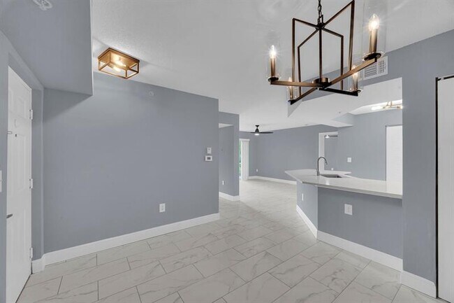 Building Photo - 3809 NW Mediterranean Ln