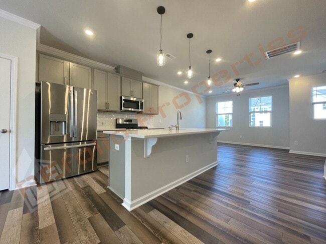 Building Photo - Gorgeous 3 Bedroom 3.5 Bath Townhome with ...