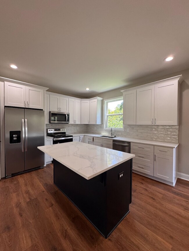 Building Photo - Spacious 5-Bedroom Greenville Home with 3.5 Baths, 2-Car Garage & Walkout Basement