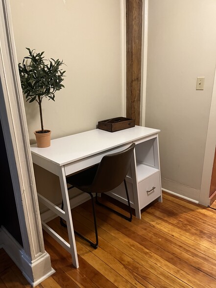 Office alcove between kitchen and living room. - 11 Kellogg St
