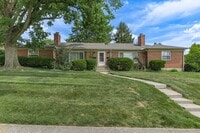 Building Photo - Quaint Duplex with a private Basement, Garage Space & Patio
