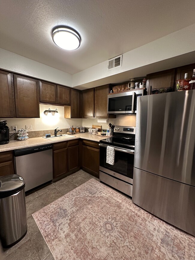 Kitchen with SS appliances - 1890 Argentine St