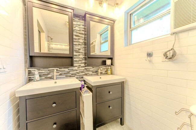 Building Photo - Lake Jessamine Luxury: Solar-Powered Waterfront Retreat on 1.14 Acres with Dock & Boathouse