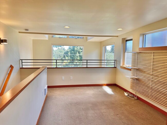 Building Photo - Three-Level Loft-Style 2BR | 3BA with Priv...