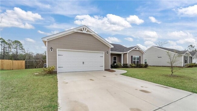 Building Photo - Relax & Unwind at this 4-Bedroom Home with Scenic Lagoon Views in Rincon