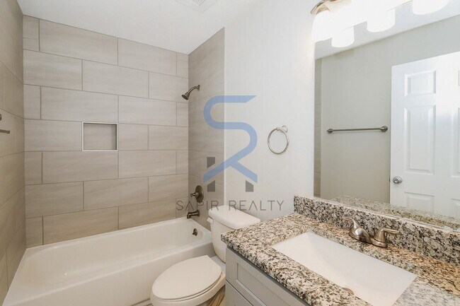 Building Photo - Move in before December 31st and choose your reward: a $250 Amazon Gift Card or a 55" Smart TV!