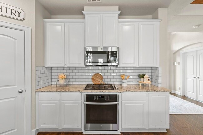 Building Photo - 9502 Windsong Dr