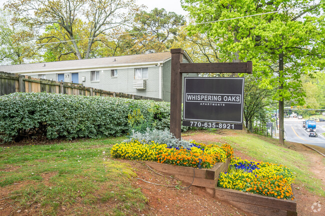 Building Photo - Whispering Oaks