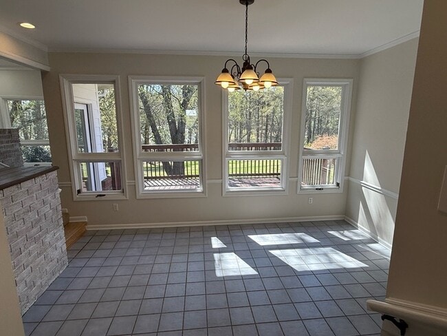 Building Photo - Spacious ranch, fenced yard, 2 car garage, large basement, near Wake Tech