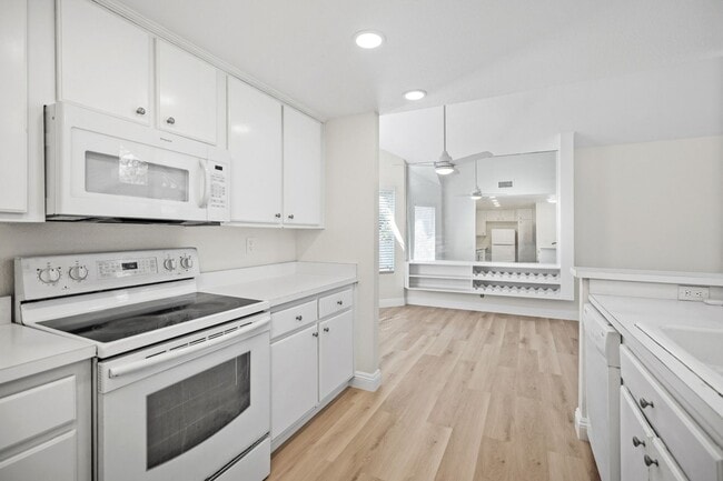 Building Photo - Prime Irvine Living: Bright End Unit Steps from Pool & Parks