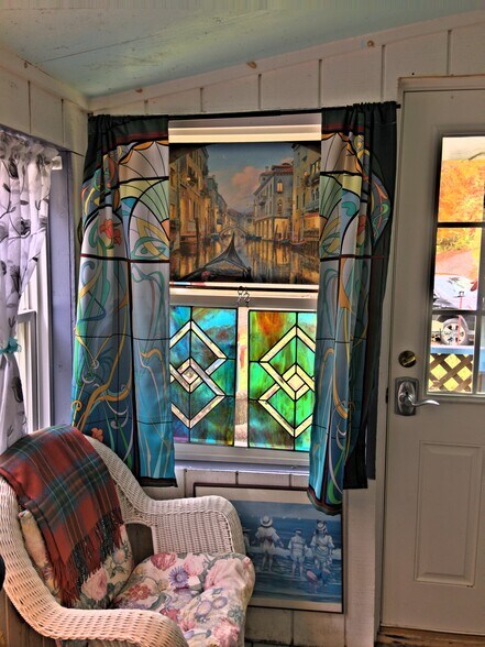 Front window in 3 season porch - 111 Causeway Rd
