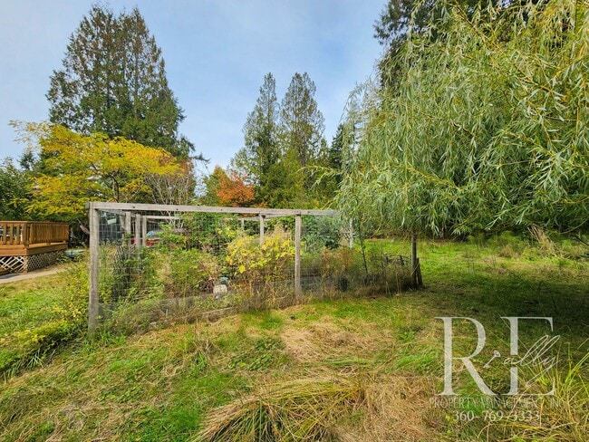 Building Photo - Waterfront Tudor | Private, Vintage Charm with Casita