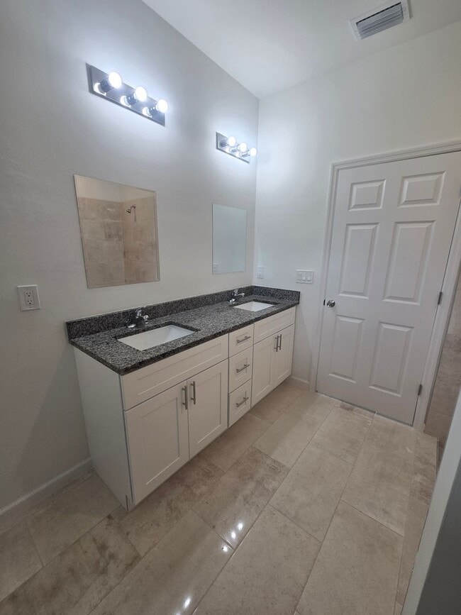 Building Photo - Brand New 3 BEDROOM 2 BATH AND ONE CAR GAR...