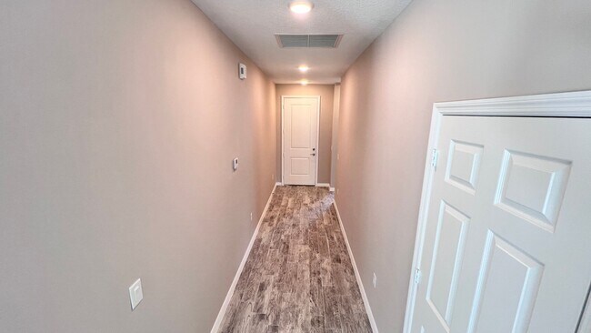 Building Photo - Spacious 3-Bedroom Home with Garage & Pati...