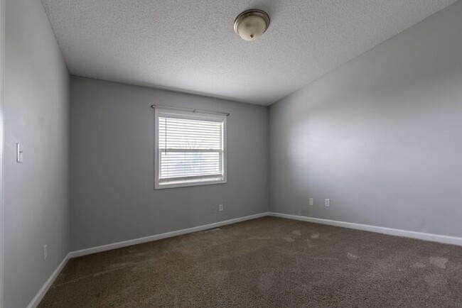 Building Photo - **Charming 3-Bedroom Home with Spacious Ya...