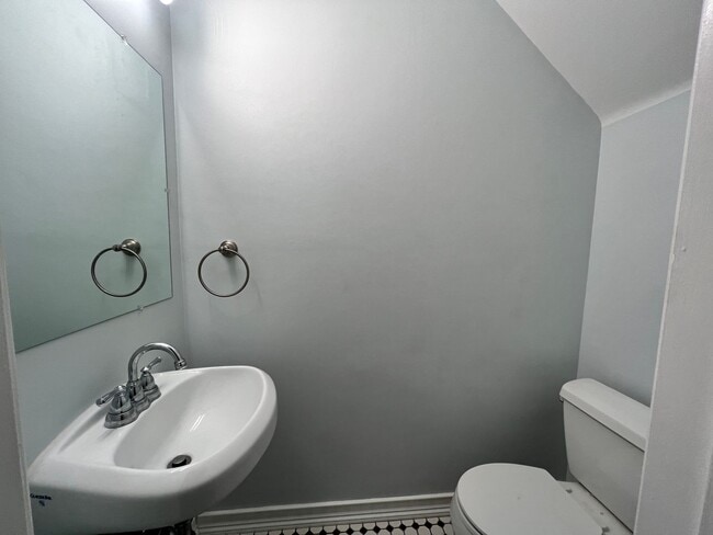 Building Photo - Three-bedroom, two-and-a-half bathrooms in...