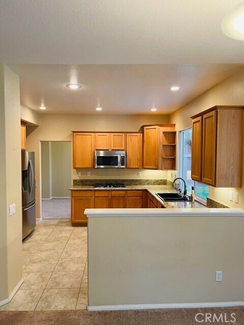 Building Photo - 42020 Dahlia Way