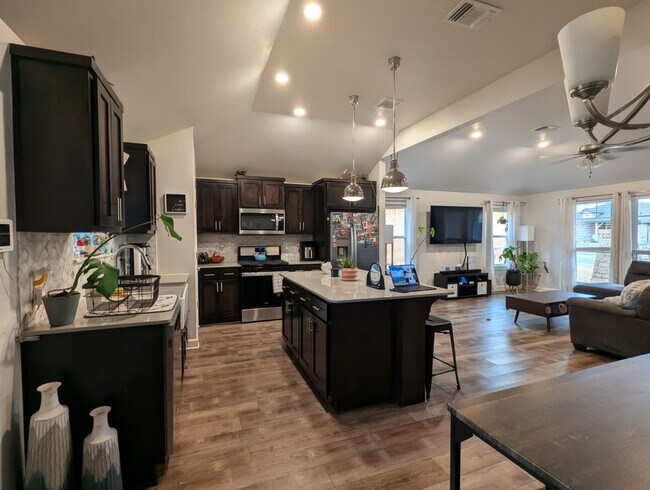Building Photo - Modern Norman Home | Storm Shelter, Covered Patio, Community Pond & Park!
