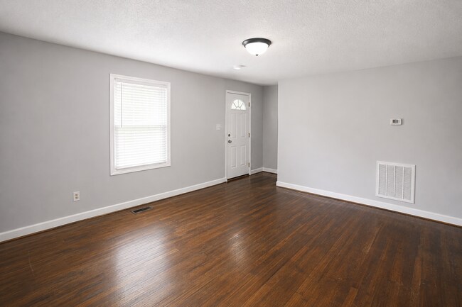 Building Photo - Updated Multi-Bedroom Home | Brand-New Deck | Circular Drive | Triad Premier Realty