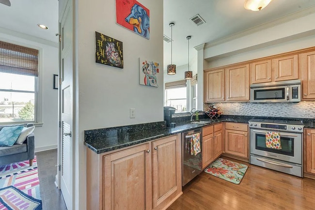 Building Photo - **Stylish Downtown Condo at The Hill – Wal...