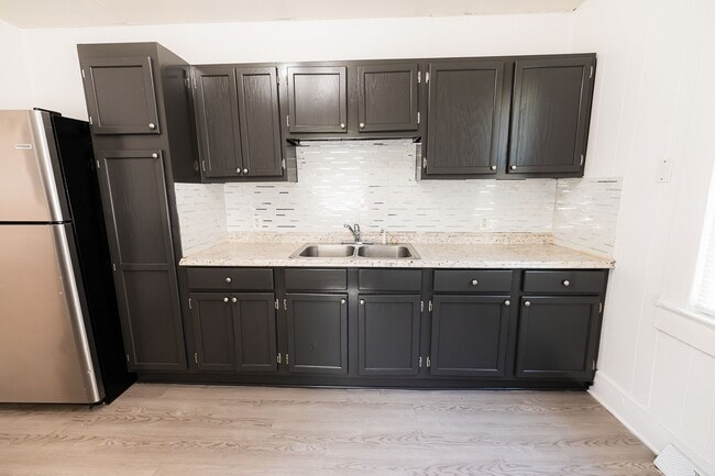 Building Photo - Move-In Ready 4BR Home with Large Backyard