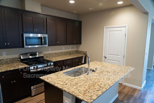 Building Photo - 5572 Amnest Way