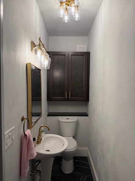 Powder Room - 5601 Wilkins Ave