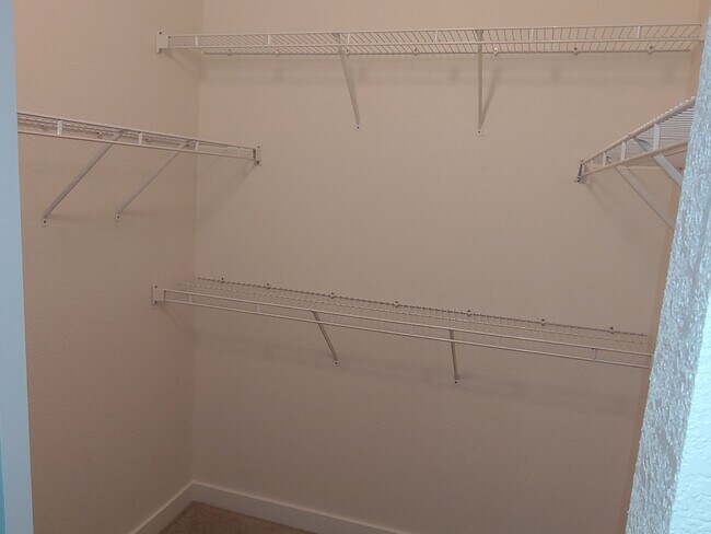 Walk-In Closet in the Master Bedroom - 18989 E Warren Dr