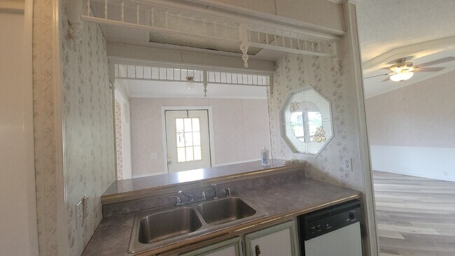 Building Photo - " 2-Bed, 2-Bath Mobile Home Retreat in Tan...