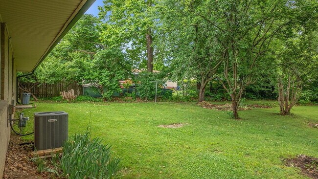 Building Photo - Simply one of those older 3-Bedroom Springdale treasures that you must see.  A three bed / two bath