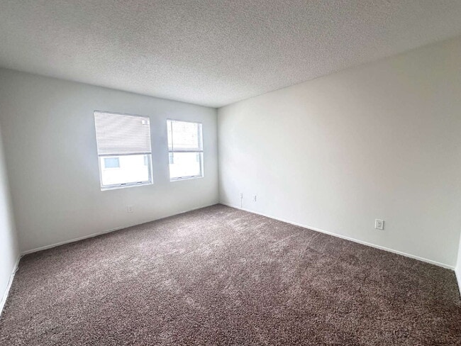 Building Photo - Bright and functional 2-bedroom, 2-bath Condo