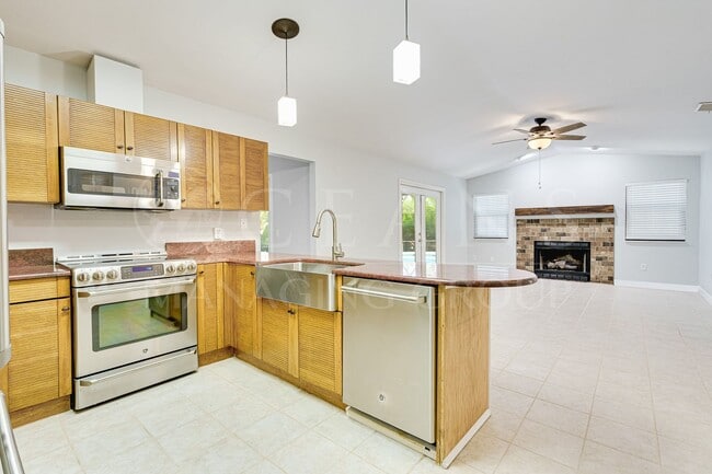 Building Photo - Executive Four-Bedroom Pool Home