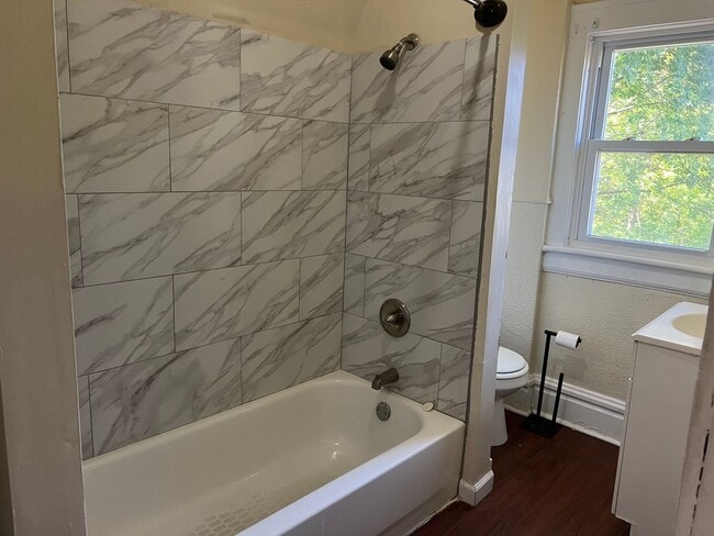 Building Photo - Bright, Spacious & Central — Minutes to Ma...