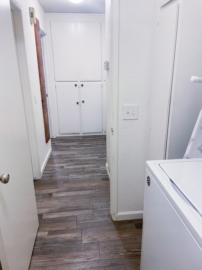 Hallway storage, looking out from laundry room (laundry machines not included) - 25770 Mariposa St