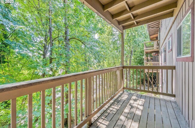 Building Photo - Spacious 2-Bedroom Condo with Forest Views, Private Balcony, In-Unit Laundry & Community Amenitie...