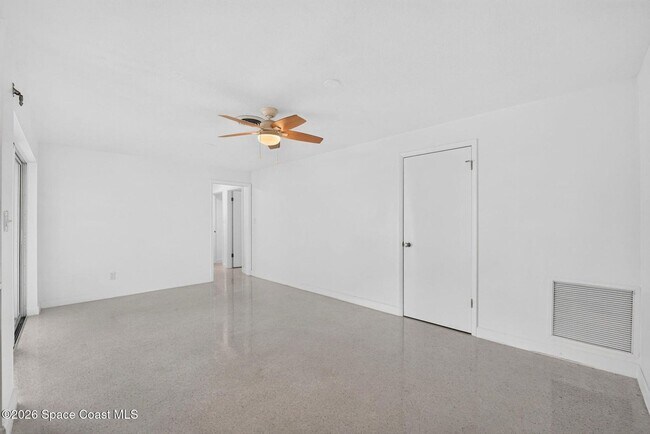 Building Photo - Welcome to this beautifully remodeled 4-bedroom, 3-bath home in the heart of Indialantic Beach!