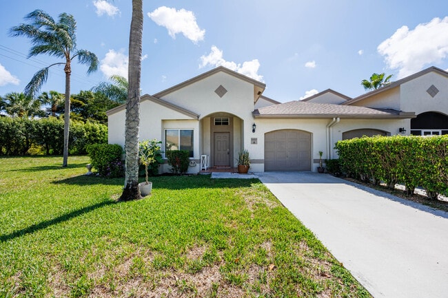 Building Photo - 9497 Boca Gardens Pkwy