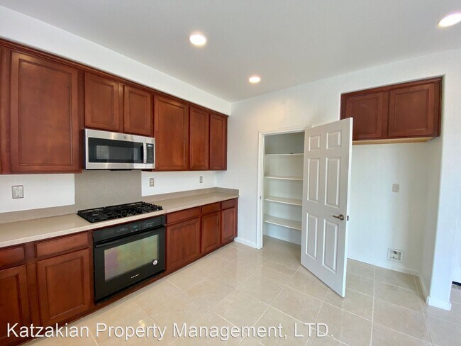Building Photo - 5 br, 3 bath House - 10814 Peony Place Dr.
