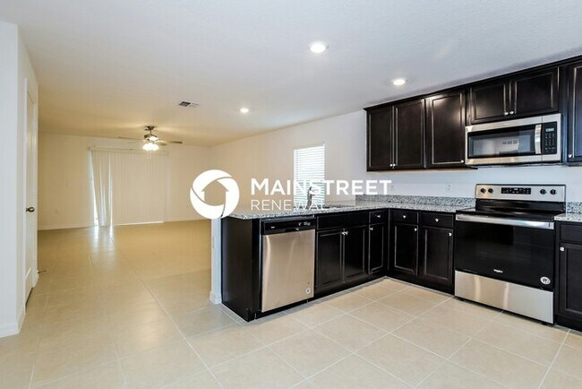 Building Photo - 4 Bedroom Pet-Friendly Home in Mascotte, F...