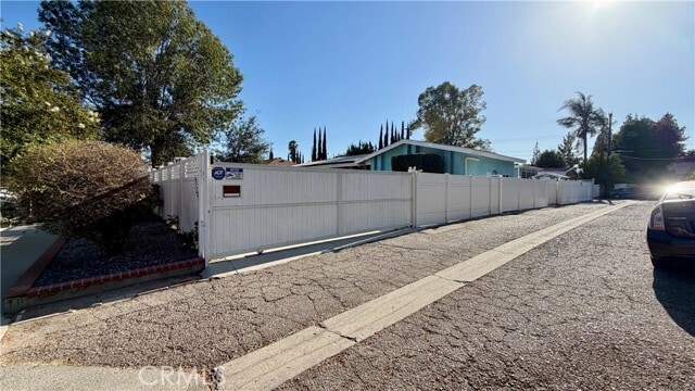 Building Photo - 7843 Woodlake Ave