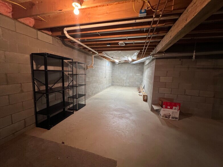 Unfinished full basement - 214 W Sixteenth St