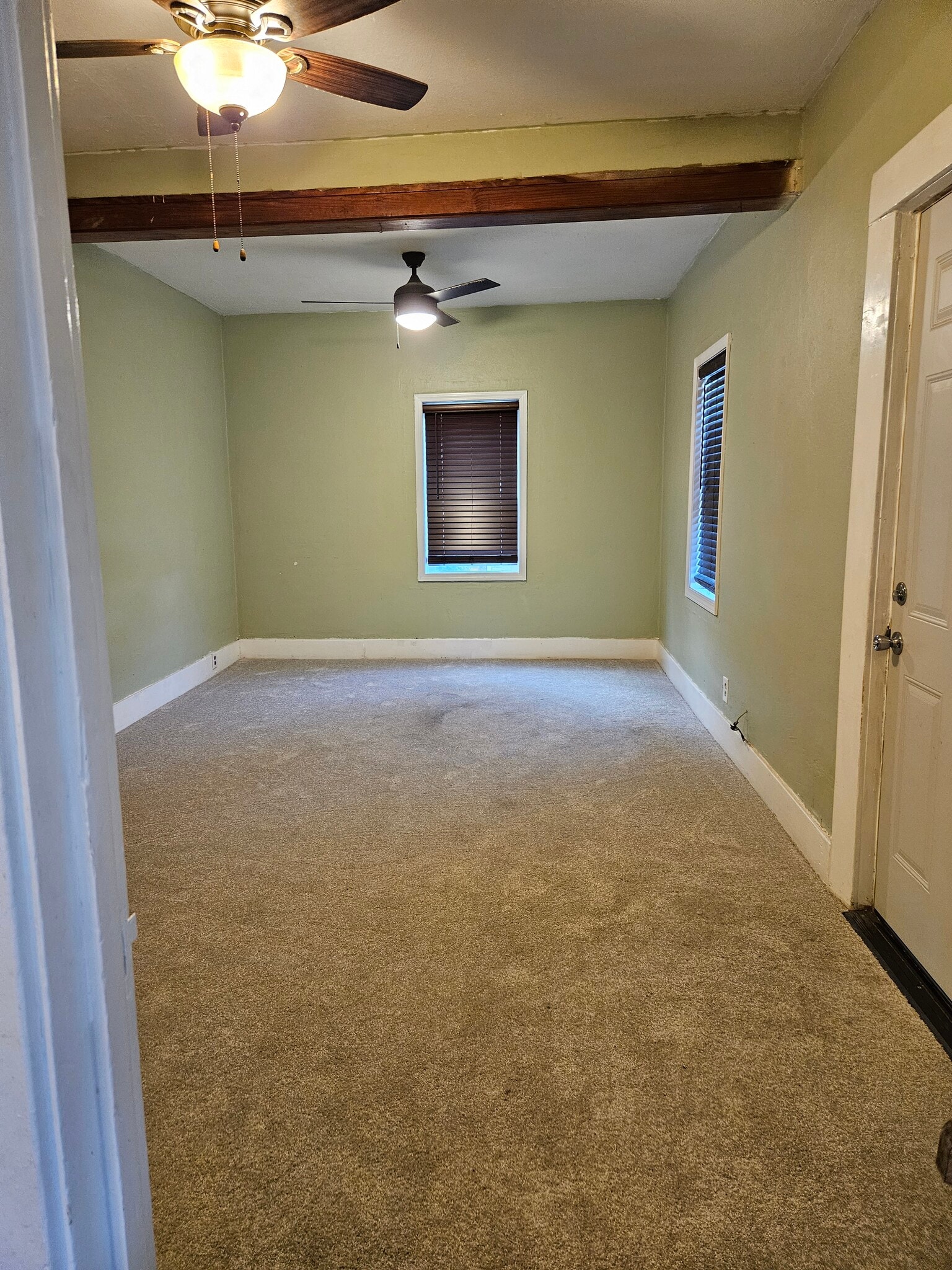 Living Room / Dining Room with new carpet and Energy Efficient Windows - 2905 Apple St