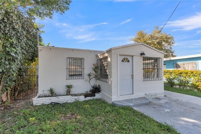 Building Photo - 6940 NW 6th Ct