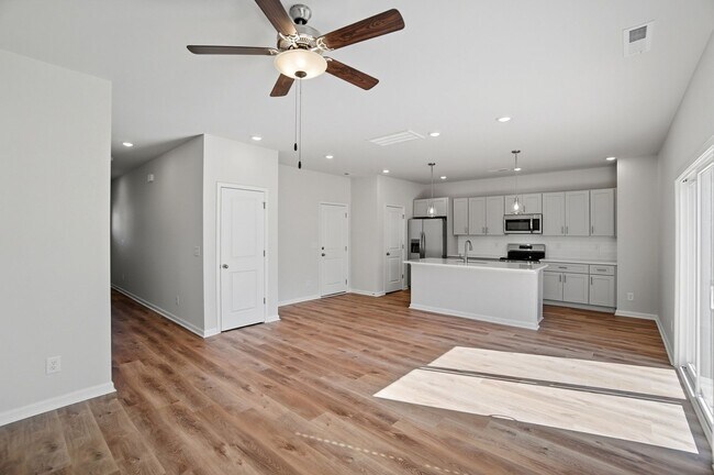 Building Photo - 4BR Home in The Pines at Paw Creek – New Construction + Private Deck