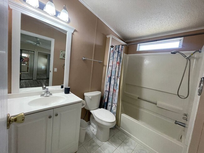 Building Photo - 2 BR 2 BATH Annual Rental in Barefoot Bay Available JUNE 2025