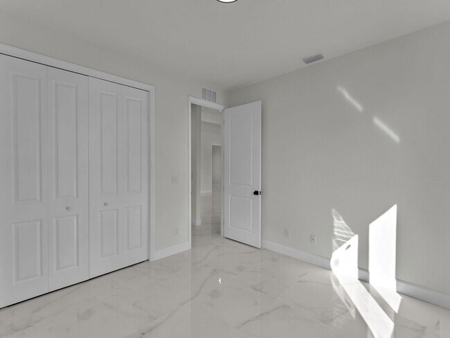 Building Photo - Brand-New Home for Rent – Port Charlotte, ...