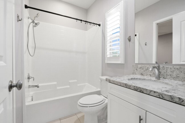 Building Photo - For Lease – 4 Bed / 3 Bath Townhome with 2-Car Garage