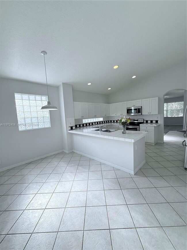 Building Photo - 5089 NW 121st Dr