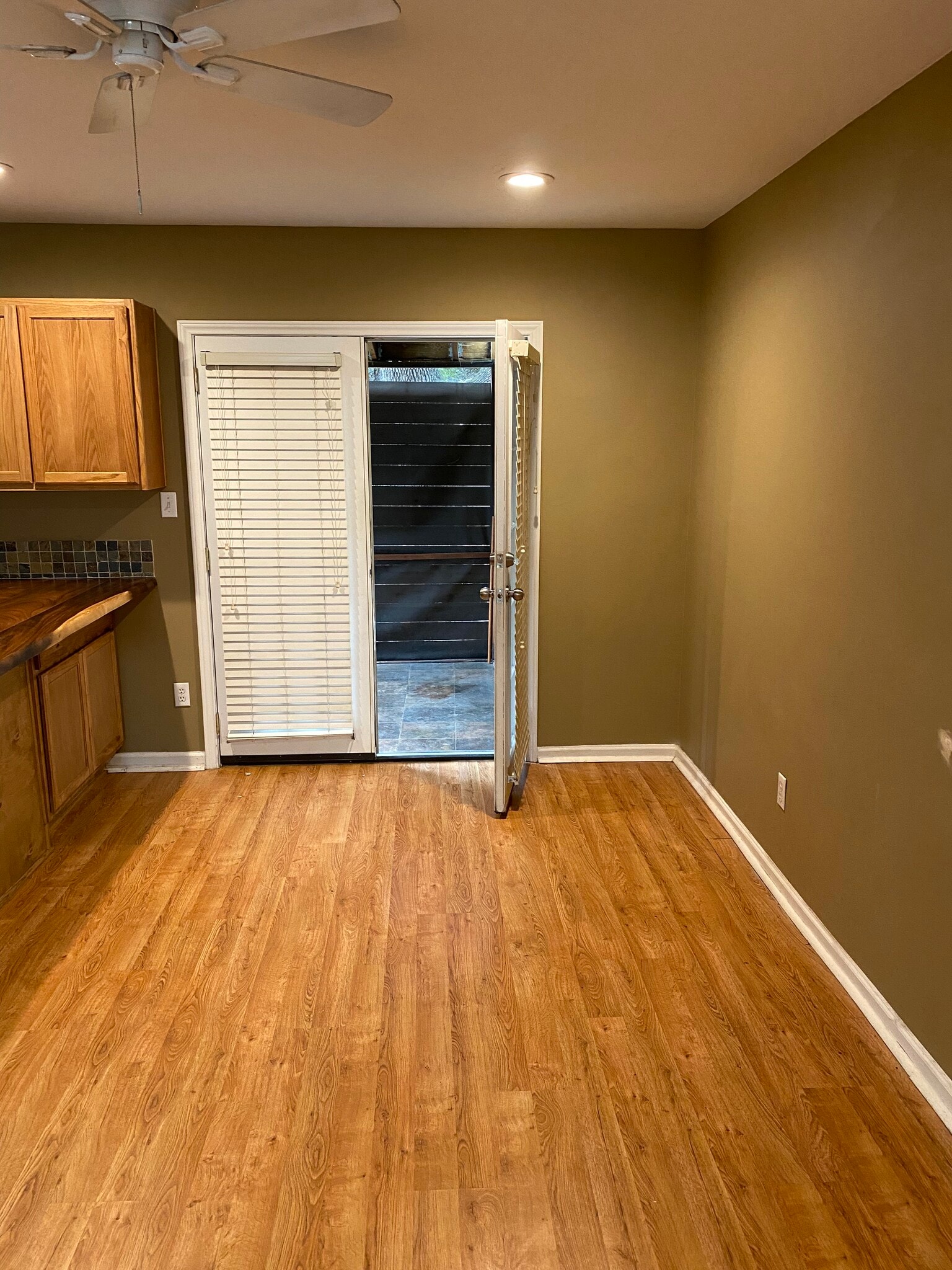 Dining room with French doors to porch - 4521 Merle Dr