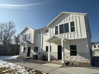 Building Photo - Half off first months rent - Beautiful townhome with 2 car garage, Central Air and Master Suite